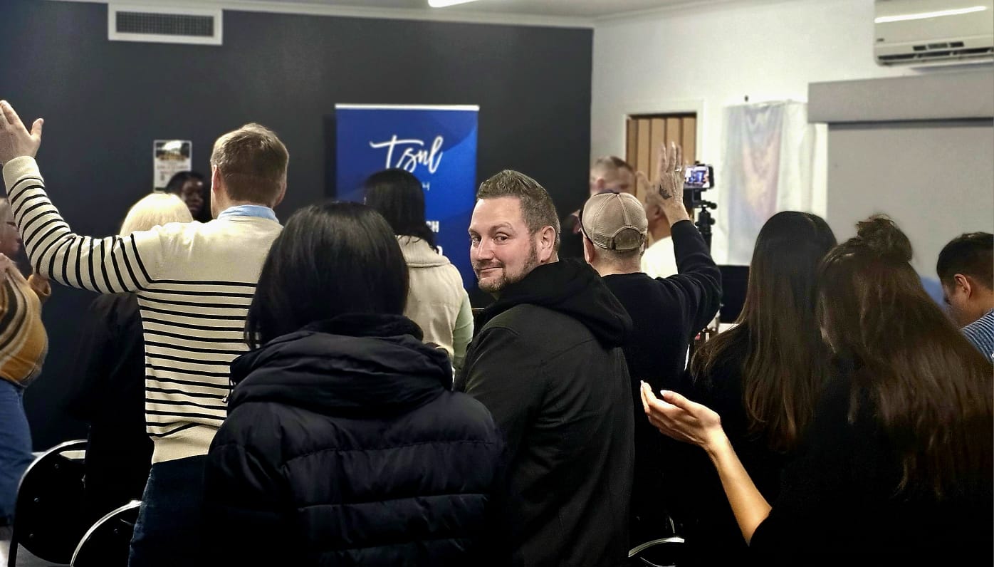 Michael leading the gathering at a Saturday service at TSNL Church Melbourne